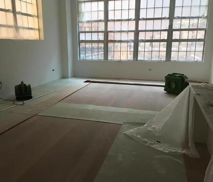 replacing wood floors after mitigation and drying
