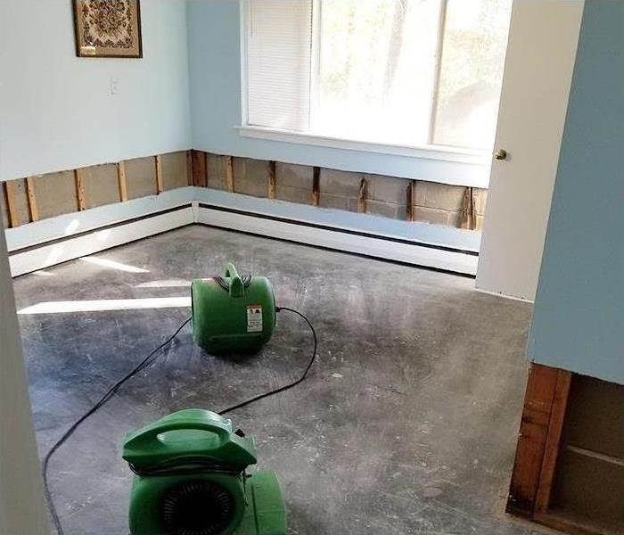 water extraction and flood cuts during water damage mitigation